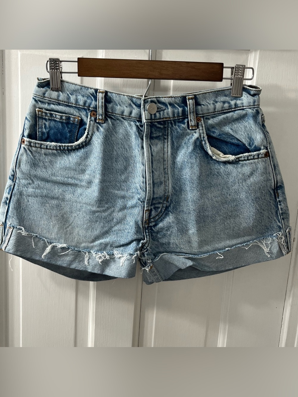 Reformation Charlie Cuffed High Rise Light Blue Distressed Denim Shorts. Size 27